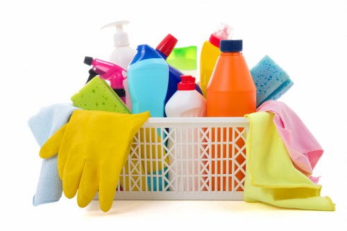 Cleaner preparing a living room in Hackney for a regular visit